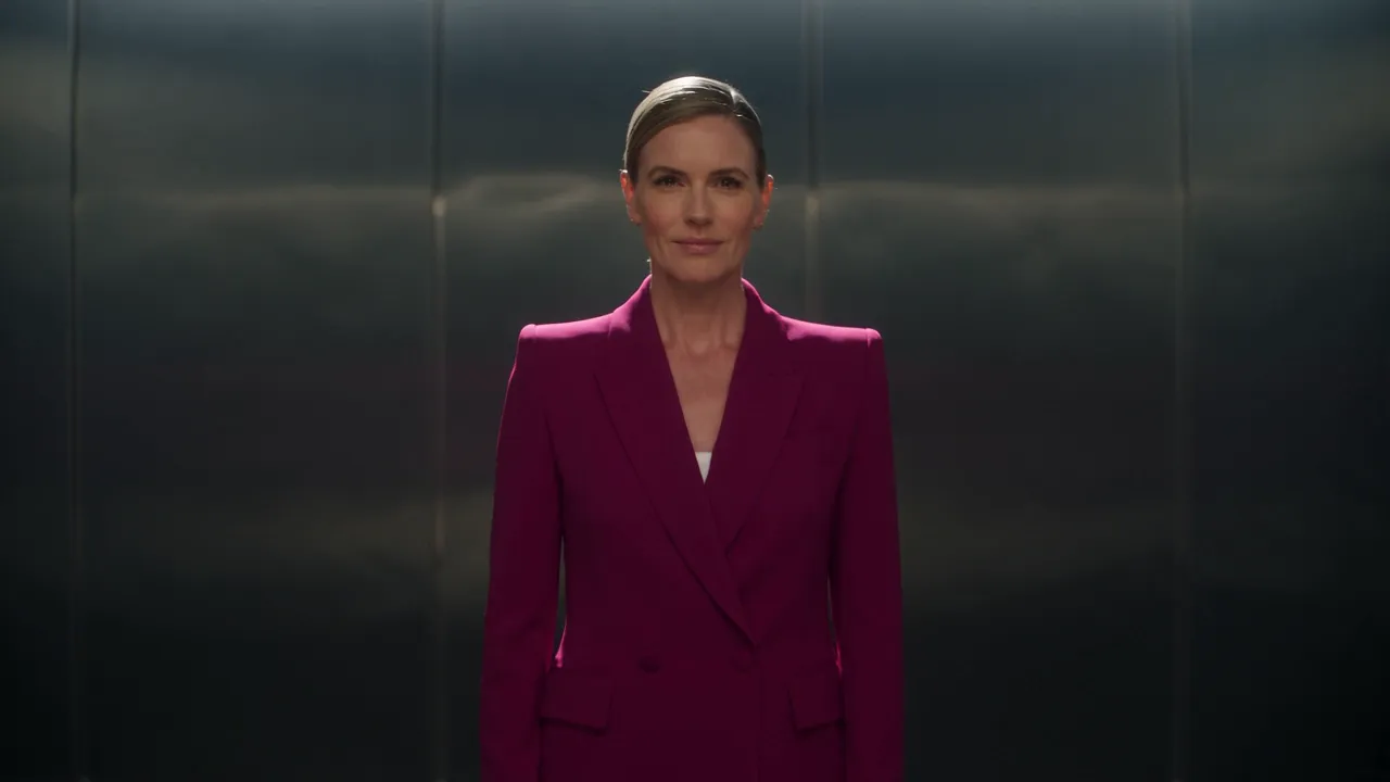 Fictional adult gallery director in an ivory suit illustrating a text-to-image composition
